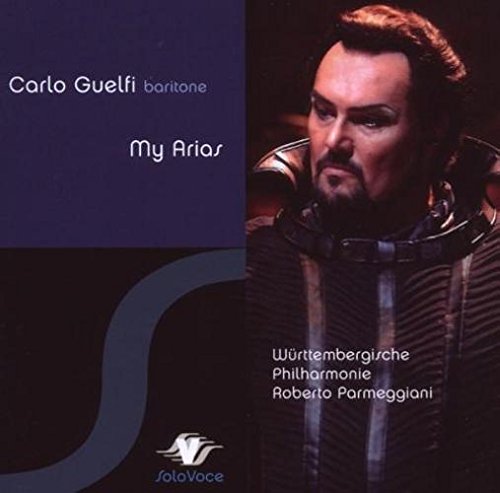 CD cover with a man in a costume, blue and black background.