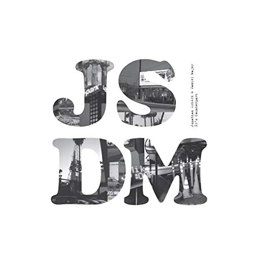 Black and white vinyl album cover with cityscape images in the text.