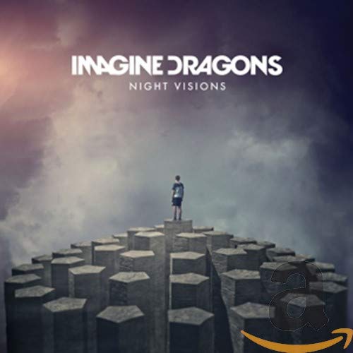 Imagine Dragons "Night Visions" CD cover with a lone figure on pillars.