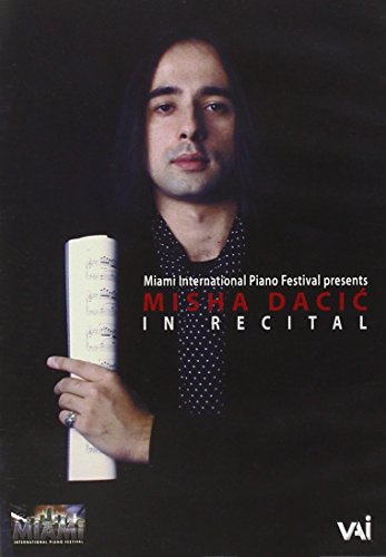 DVD cover featuring a man holding sheet music against a dark background.