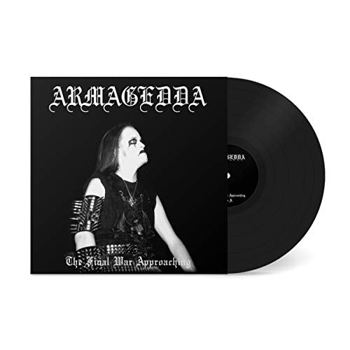 Black vinyl record with cover art featuring a person in dark clothing.