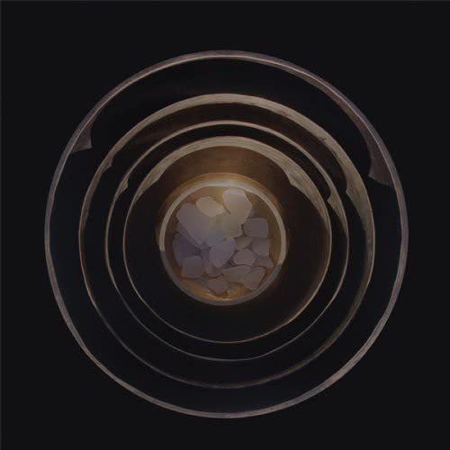 Dark abstract vinyl record cover with concentric circles and a bright center.