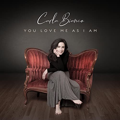 Carla Bianco album cover: woman seated on a red Victorian couch.