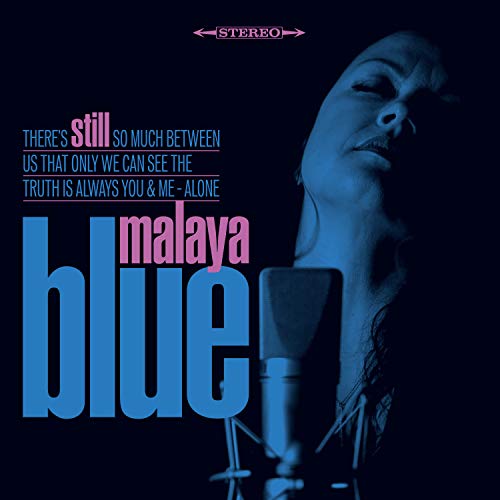 CD cover for Malaya Blue’s “Still” featuring a woman with a microphone.