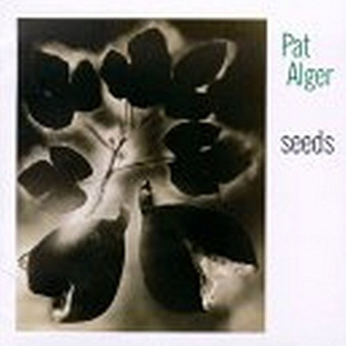 "CD cover with sepia-toned image of leaves and bird, titled 'Pat Alger - Seeds'."