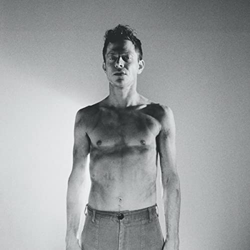 Black and white portrait of shirtless man, Perfume Genius album cover.