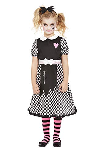 Young girl wearing a black and white checkered "broken doll" costume with pink striped tights.