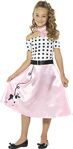 A young girl wearing a 1950s-style pink poodle dress costume with black polka dots.