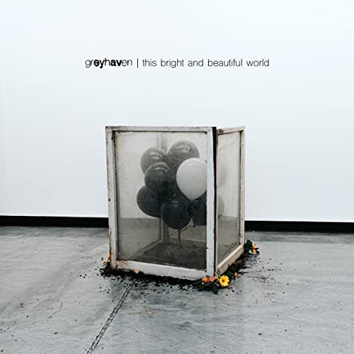 CD cover: greyhaven, balloons in a glass box, flowers below.