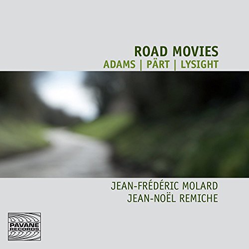 Album cover with a blurred road image, featuring artist and title text.