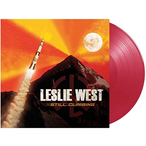 Leslie West "Still Climbing" vinyl record with rocket and moon cover art.