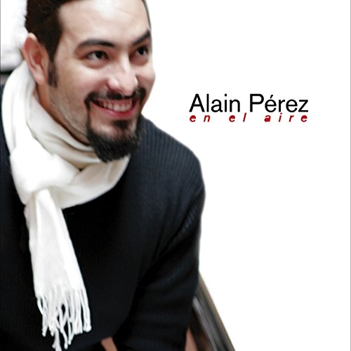 Alain Pérez album cover, smiling man with white scarf, dark background.