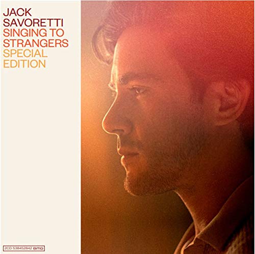 "Album cover featuring a man's profile with text on the left side."