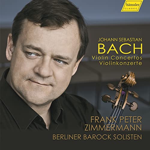 Portrait of violinist Frank Peter Zimmermann with a violin, album cover.