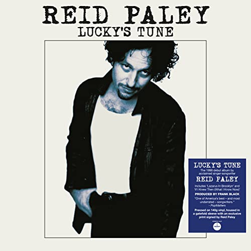 Vinyl record cover featuring a portrait of Reid Paley and blue text.