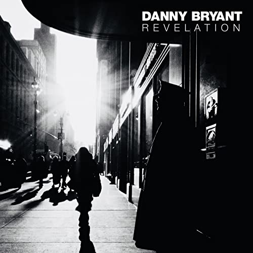 CD cover for Danny Bryant’s “Revelation” featuring a silhouetted figure.