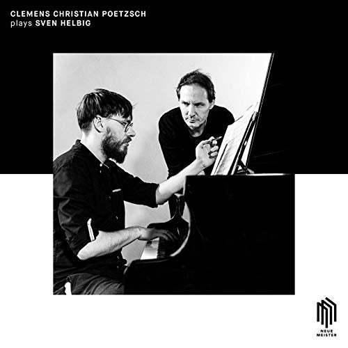 Black and white image of two men at a piano on a black and white album cover.