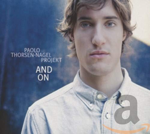 CD cover featuring a young man’s portrait with album title “And On.”