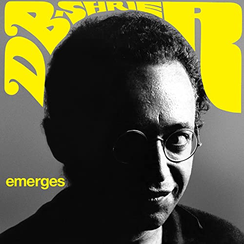 CD cover: black and white portrait of a man with glasses.