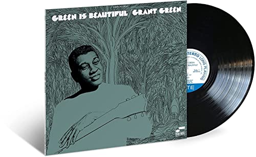 Grant Green album cover with portrait and vinyl record shown.