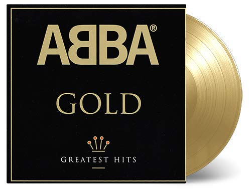 "Two gold vinyl records with black covers and collage artwork, packaged in a black box."