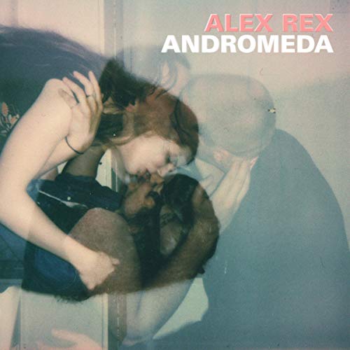 Vinyl record cover with double-exposed image of a couple embracing, artist and album name.