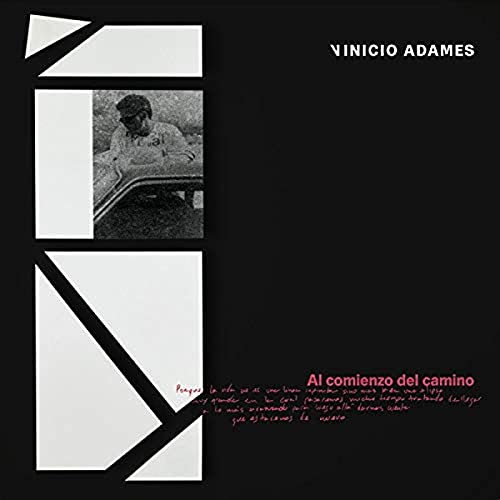 Black vinyl record cover with a man in a car and red text.