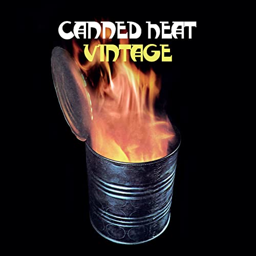 Open metal can with bright flames inside, black background, text above.