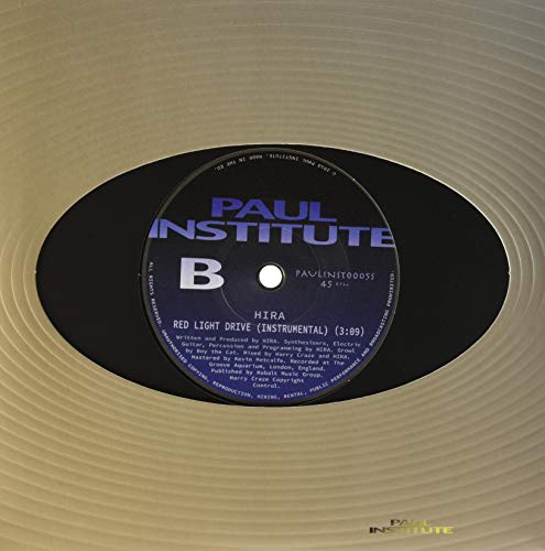 Black vinyl record label with white text: "Paul Institute" and "Hira.