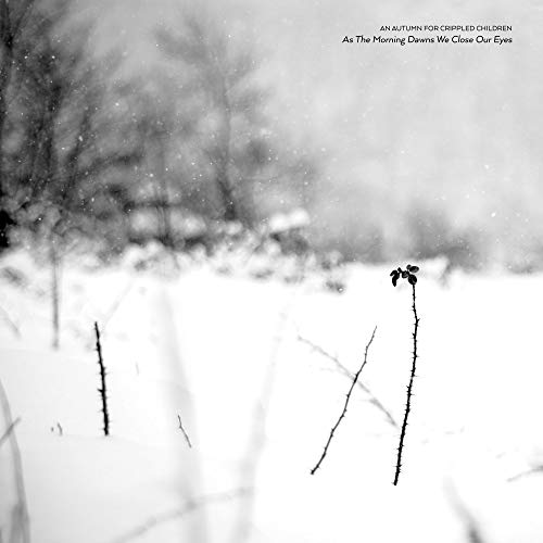 Black and white CD cover with snowy landscape and bare branches.