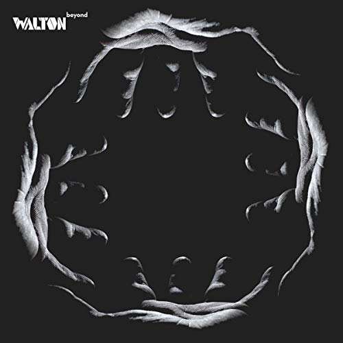 Black and white album cover with abstract, circular hand imagery.