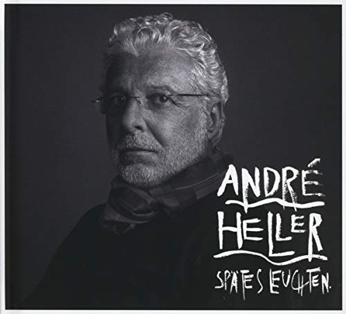 Black and white CD cover featuring a man with glasses and curly hair, text "Andre Heller Spates Leuchten".