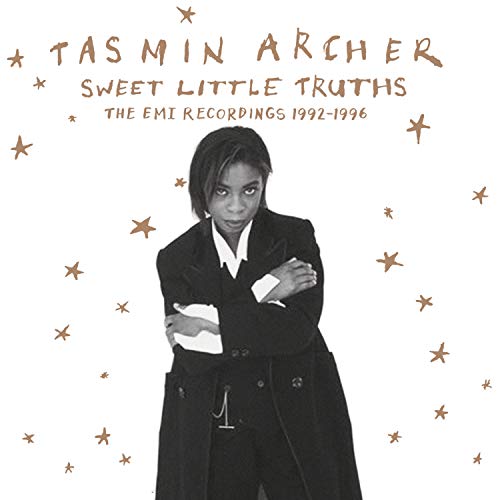 "Album cover featuring a black-and-white woman surrounded by gold stars on a white background."
