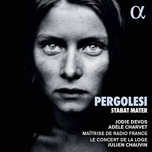 CD cover featuring a close-up portrait of a woman’s face, with text.
