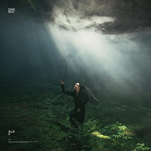 Album cover for Allie X’s “Cape God” featuring a person in a forest.