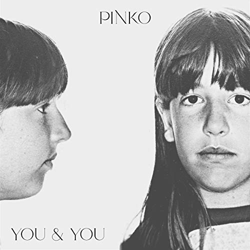 Black and white CD cover featuring two faces in profile, titled "You & You".