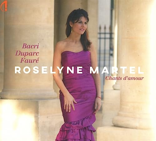 WomanSH Roselyne Martel in a purple strapless dress standing between stone columns.