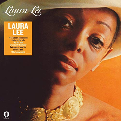 Laura Lee album cover, close-up portrait of a woman in a hat.