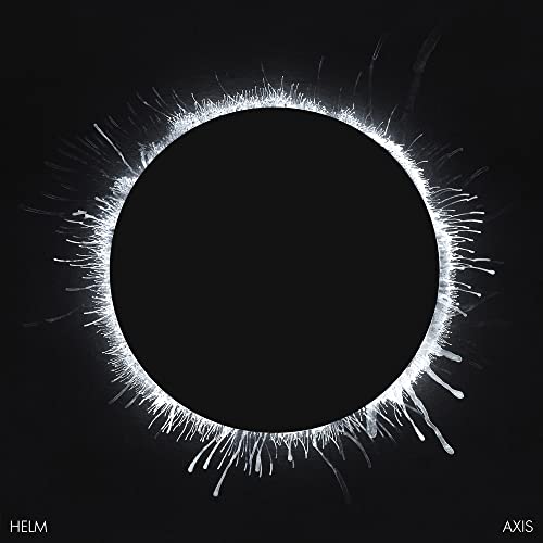 Black circle with radiating white spikes against a dark background.