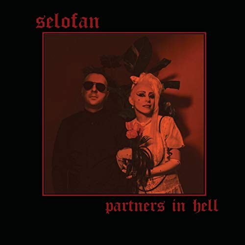 Album cover with man and woman in red-toned image, on black background.