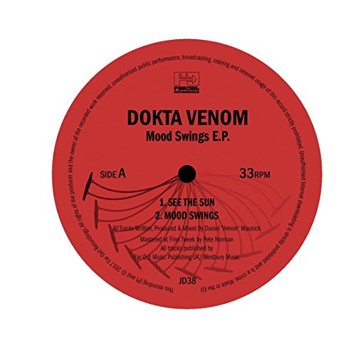 A black vinyl record with a label, in a sleeve, with a "Dokta Venom" title.
