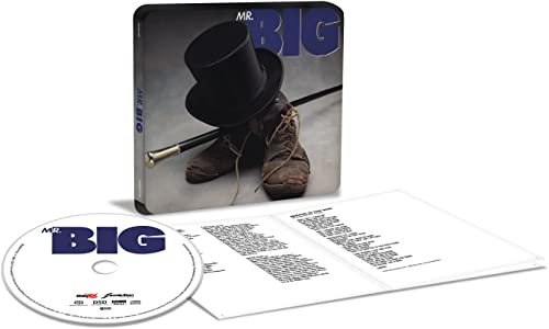 CD case with image of boots, top hat, and cane; CD and booklet shown.