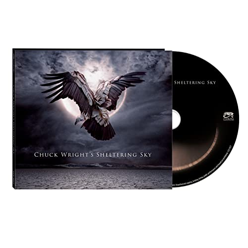 CD case and disc for "Chuck Wright’s Sheltering Sky" with eagle image.
