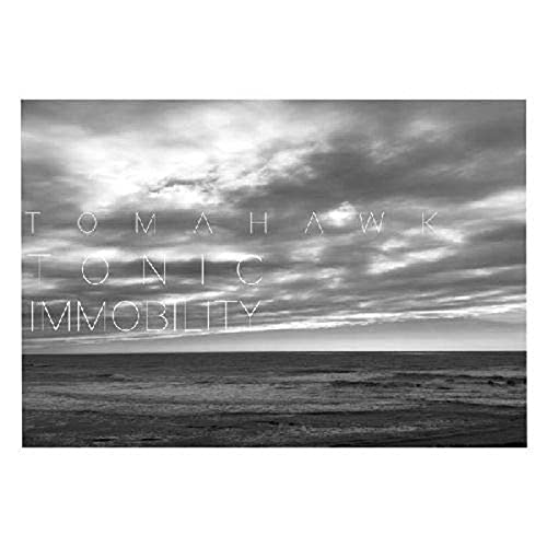 Tomahawk album cover: cloudy sky over ocean, text "Tonic Immobility".