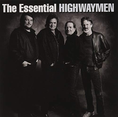 Black and white photo of four men, The Highwaymen, posing together.