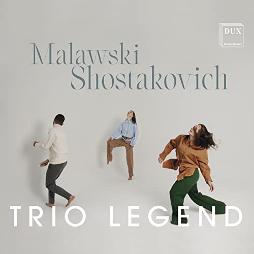 CD cover: "Trio Legend" with three figures in motion, muted colors.