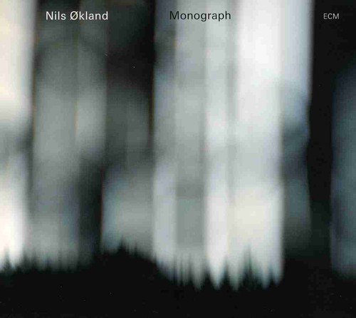 Album cover with blurry white and black design, featuring "Nils Okland Monograph" text.