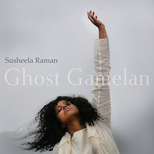 CD cover: woman with raised arm against a grey sky.