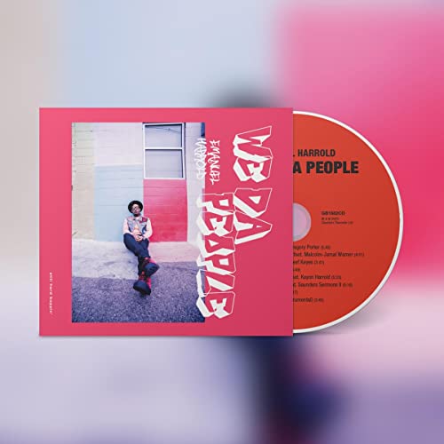 CD case with a man sitting in front of a red and blue building.