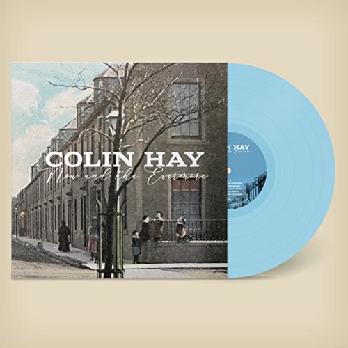Colin Hay album cover and light blue vinyl record shown.